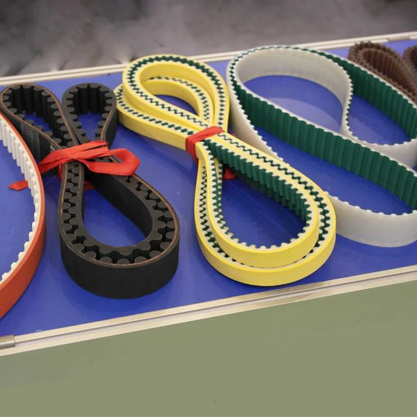 What are the common conveyor belt materials